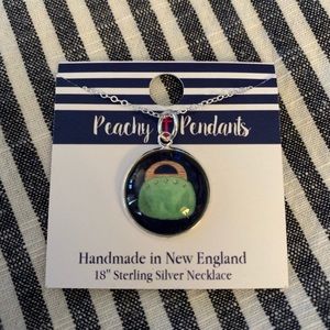 Gold necklace and Bermuda bag pendant